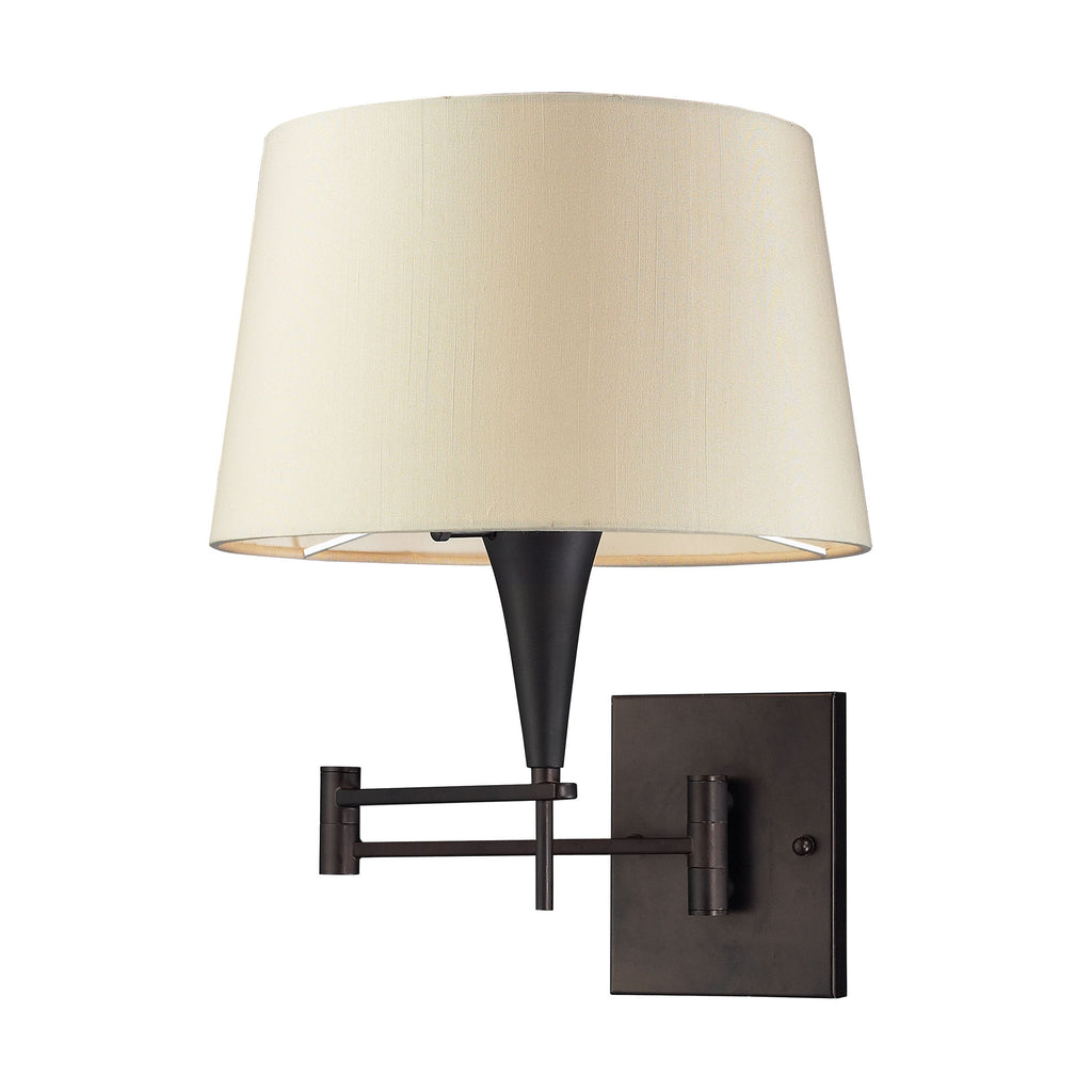 1-Light Swingarm Sconce in Aged Bronze with Beige Shade